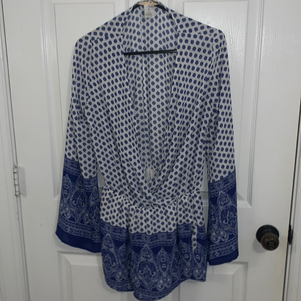 ROMPER. the button to pin up the front is missing but I usually wore a bralette